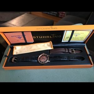 Stuhrling watch with black and brown bands